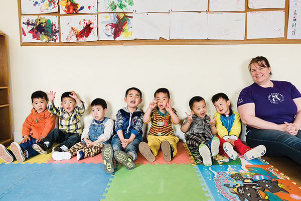 seven preschool boys and teacher